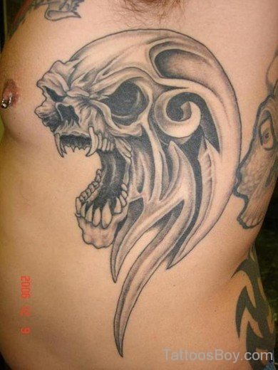 Angry  Alien Tattoo On Rib-TB131