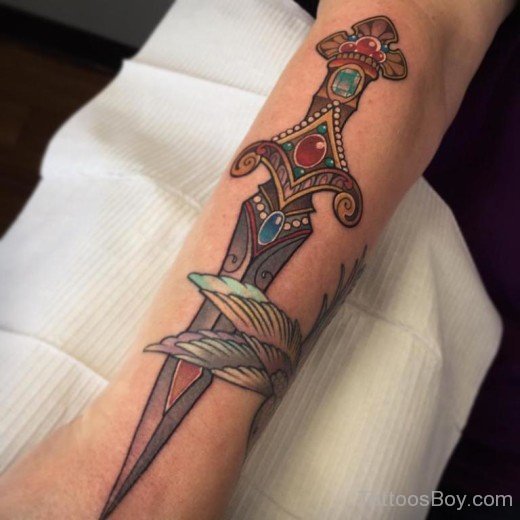 Attractive Dagger Tattoo On Wrist-TB12010