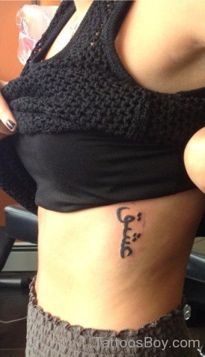 Word Tattoo On Rib-