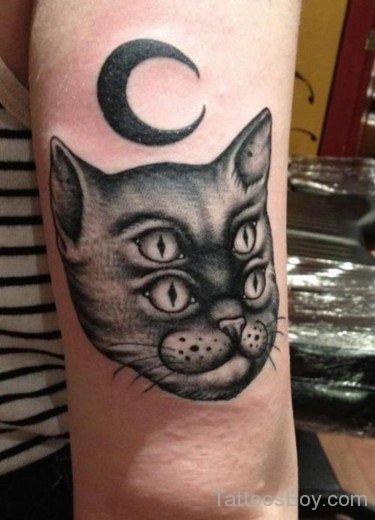 Cat Face Tattoo On Elbow