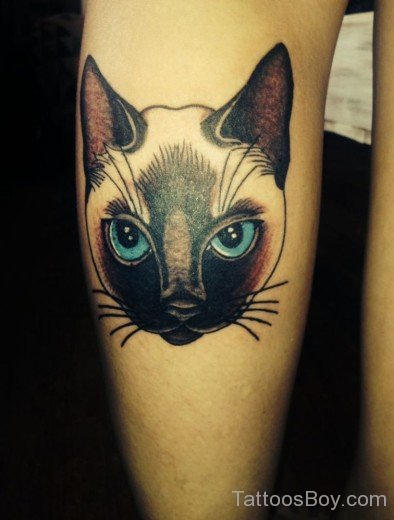 Cat Face Tattoo On Leg