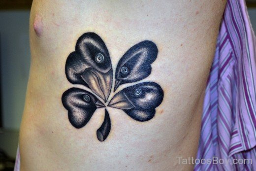 Clover And Eyes Tattoo On Rib-TB12063