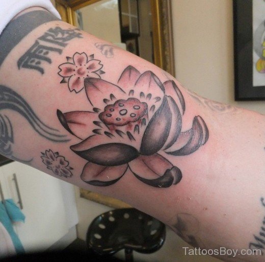 Lotus With Buddhist Symbol Tattoo On Arm-TB1108