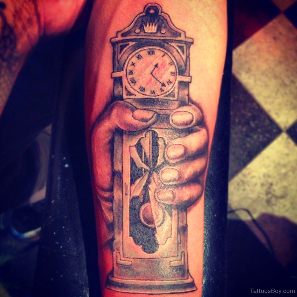 Old Clock Tattoo On Arm
