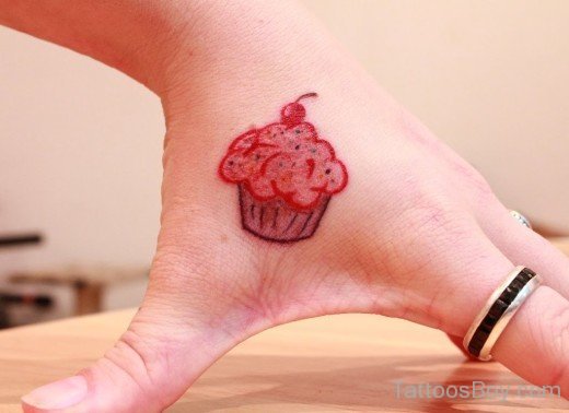Small Cupcakes Tattoo On Hand-Tb1251