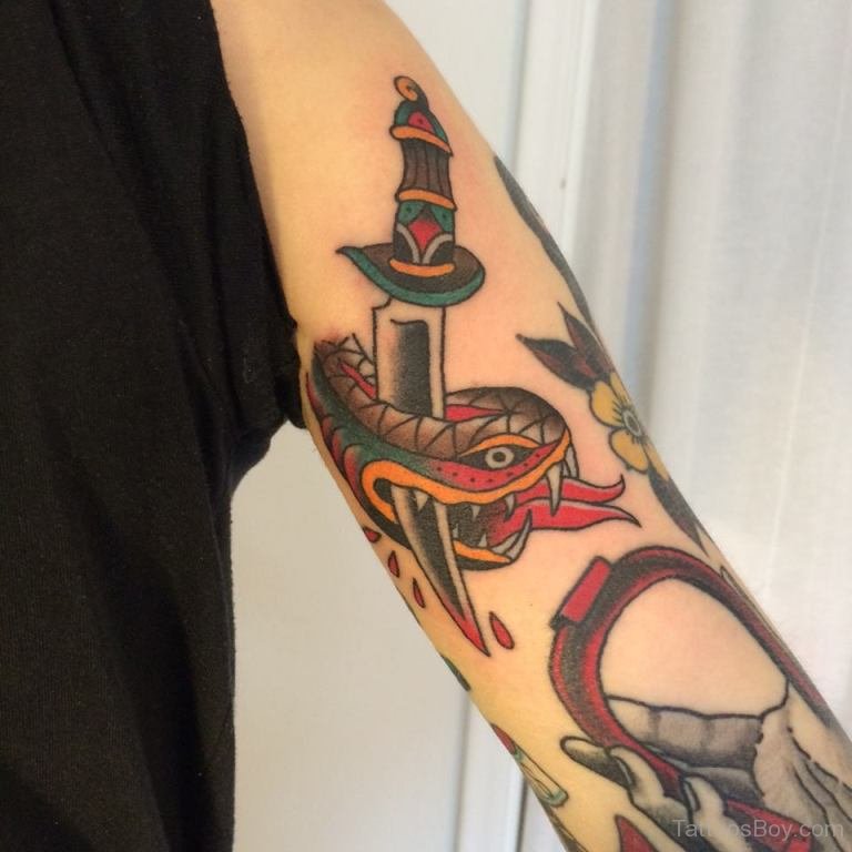 Snake And Dagger Tattoo On Shoulder | Tattoo Designs, Tattoo Pictures