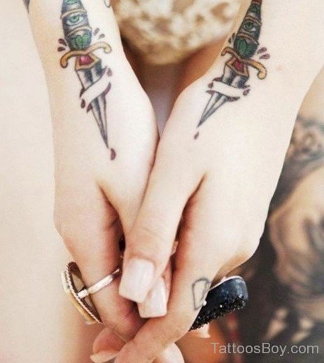 Traditional Knife And Dagger Tattoos On Hand-TB12096