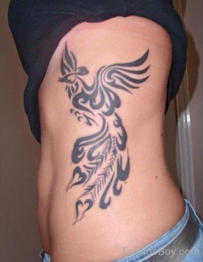 Tribal Bird Tattoo On Rib
