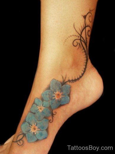 Awesome Flower Tattoo On Foot-TB12005
