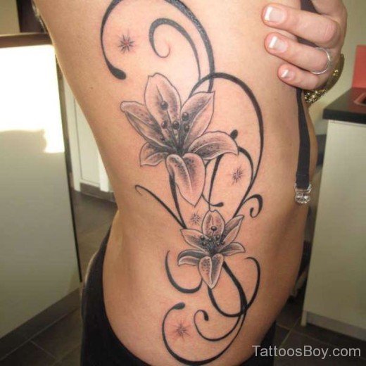 Black And Grey Hibiscus Flower Tattoo On Rib-TB12019