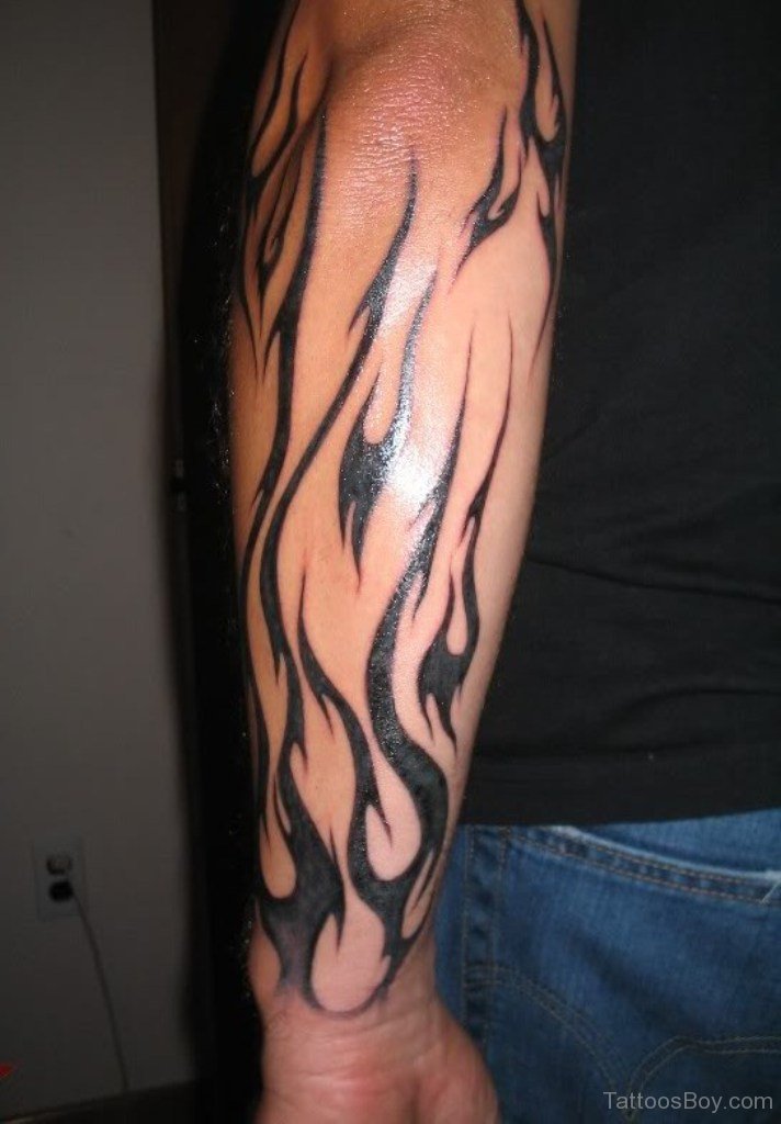 Black Flame Tattoo On Arm.