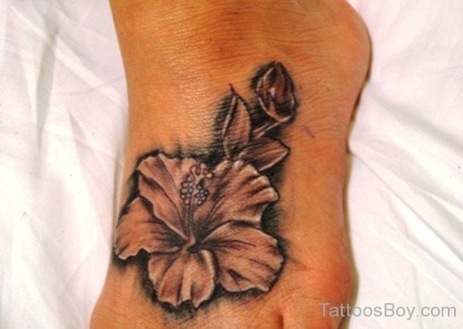 Black Hibiscus Tattoo On Foot-TB12022