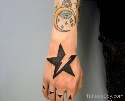 Black Star Tattoo On Hand