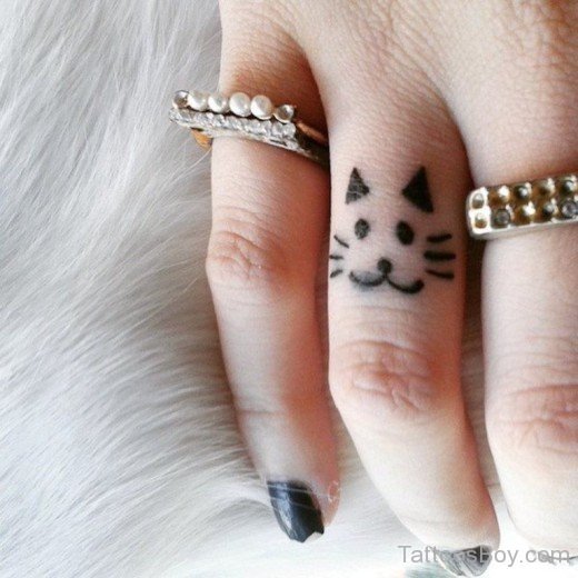 Mini cat finger tattoo | Small tattoos, Beautiful small tattoos, Small  tattoo designs