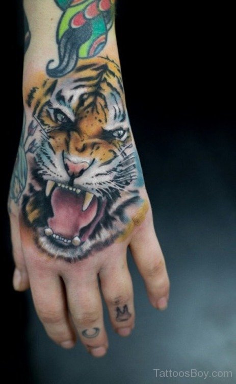 Colored Tiger Tattoo On Hand | Tattoo Designs, Tattoo Pictures
