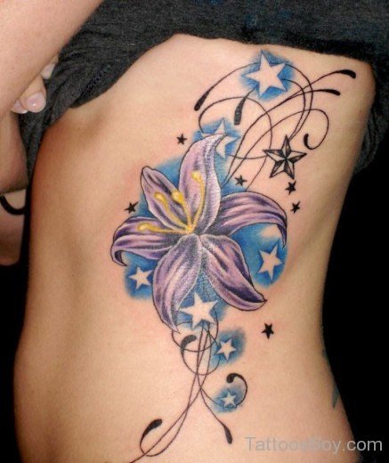 Coloreful Lily Tattoo On Rib-TB12034