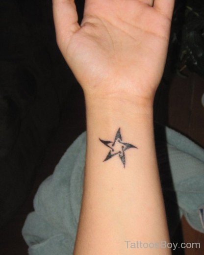Fantastic Star Tattoo On Wrist-Tb121