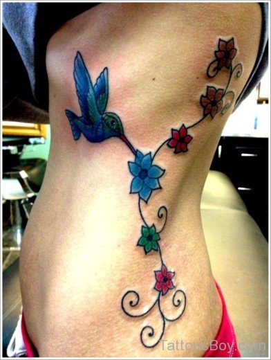 Pretty Flower And  Hummingbird Tattoo On Rib-TB1048