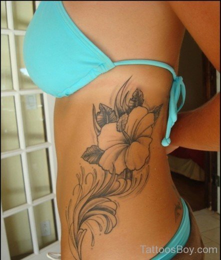 Graceful Hibiscus Tattoo On Rib-TB12054