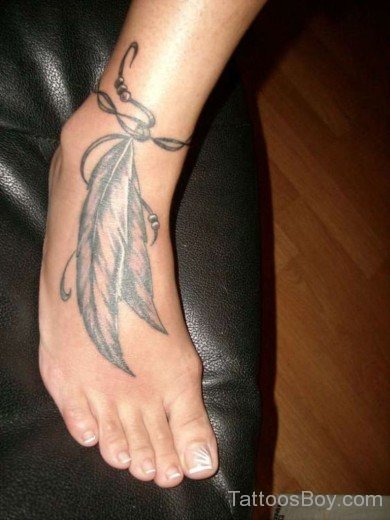 Grey Feather Tattoo On Foot-AWl1056