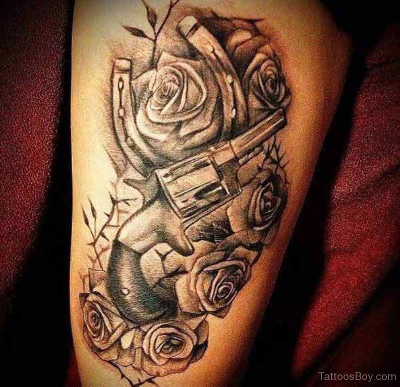 guns and roses thigh tattoo