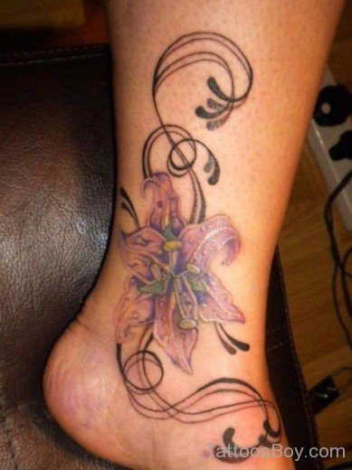 Nice Hibiscus Flower Tattoo Design On Ankle-TB12073