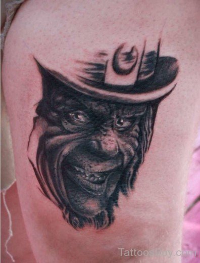 Leprechaun Face Tattoo On Thigh-TB12049