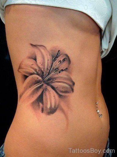 Lily Tattoo On Rib