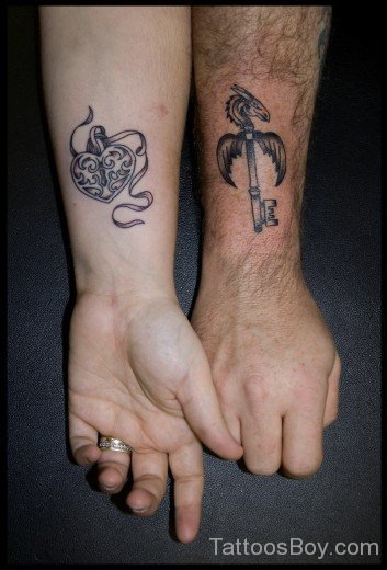 Awesome Lock And  Key Tattoo On Wrist 