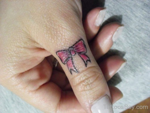 Pink Bow Tattoo On Finger-AWl1078