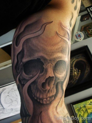 Skull And Flame Tattoo On Bicep-TB1091