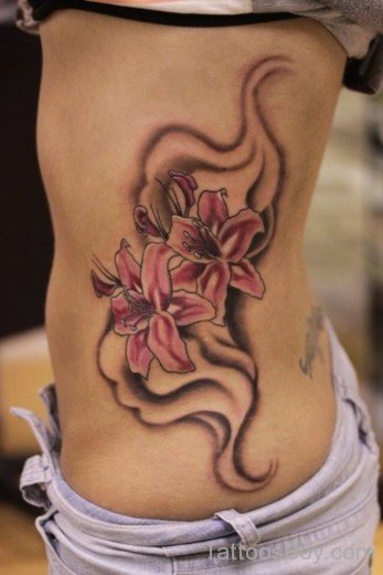 Stylish Lily Tattoo On Rib-TB12143