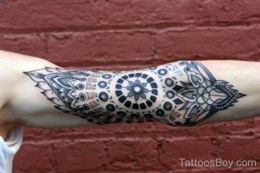 Tibetan Tattoo On Bicep