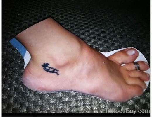 Tiny Kokopelli Tattoo On Ankle-TB169