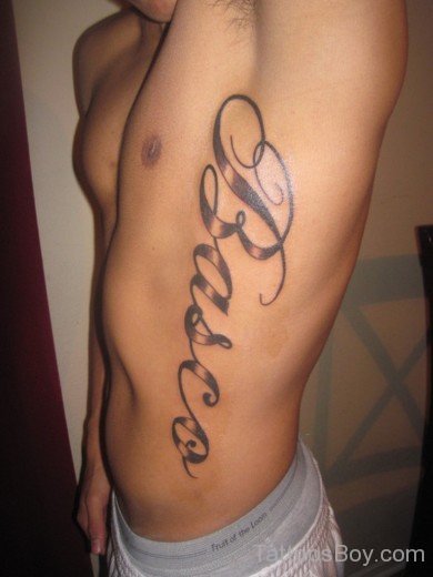 Word Tattoo On Rib