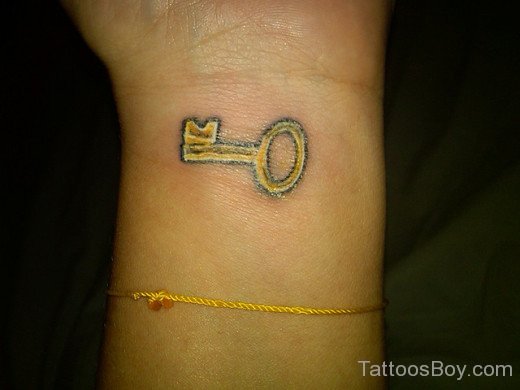 Yellow Key Tattoo On Wrist-TB1169