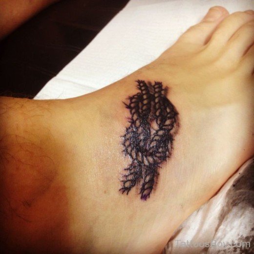 Beautiful knot Tattoo On Foot-TB1095