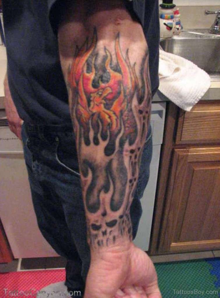 Tribal Flame Tattoo On Arm.