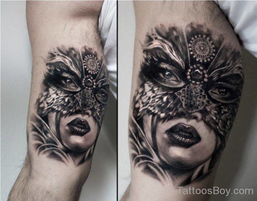 Awesome Mask Tattoo On Bicep-TB103