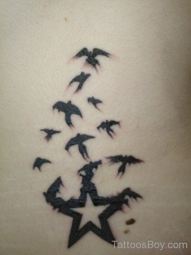 Birds And Bat Tattoo