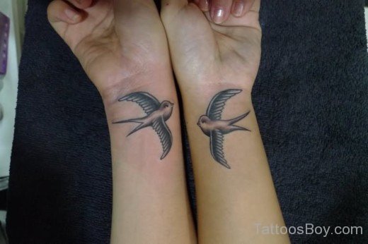 Black And Grey Flying Sparrow Tattoo On  Wrist-Tb1023