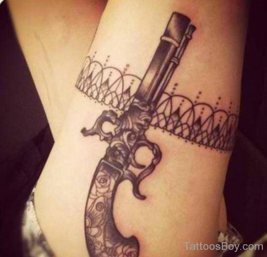 Black Skull Gun Tattoo