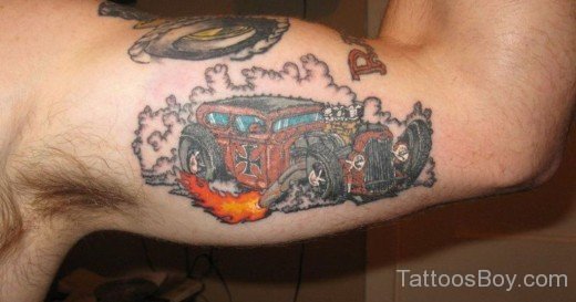 Colored Car Tattoo On Bicep-TB132