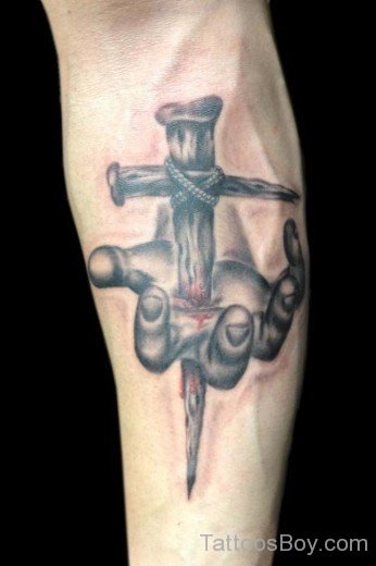 Cross Tattoo On Elbow