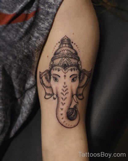 Elegant Ganesha Face Tattoo