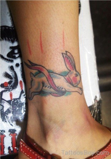 Fast-Running-Rabbit-Tattoo-On-Leg-TB144.jpg