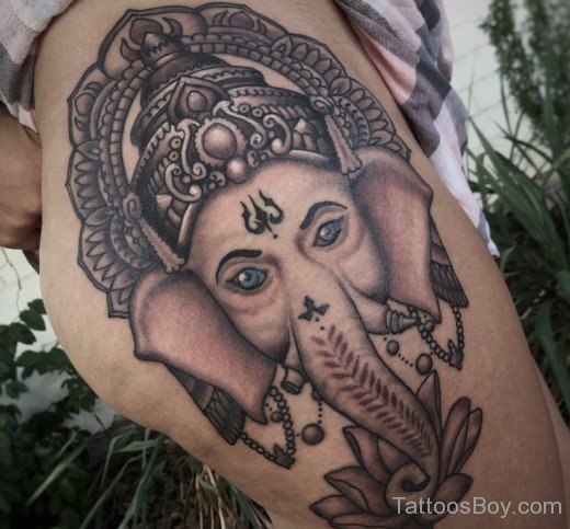 Elegant Ganesha Face Tattoo Design 