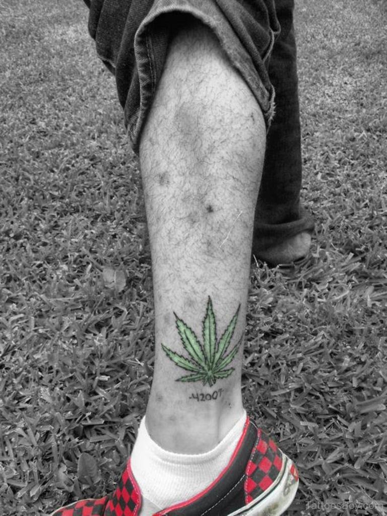 Green Leaf Tattoo On Ankle.