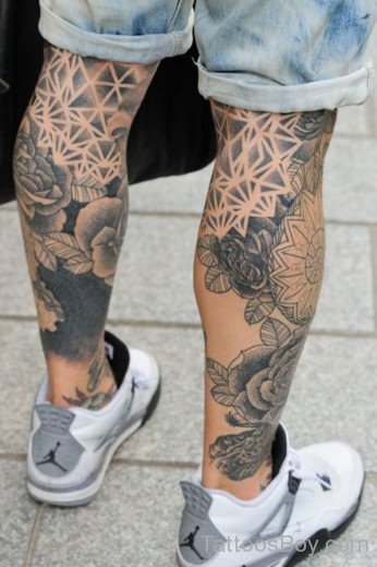 Grey Flower Tattoo On Leg 
