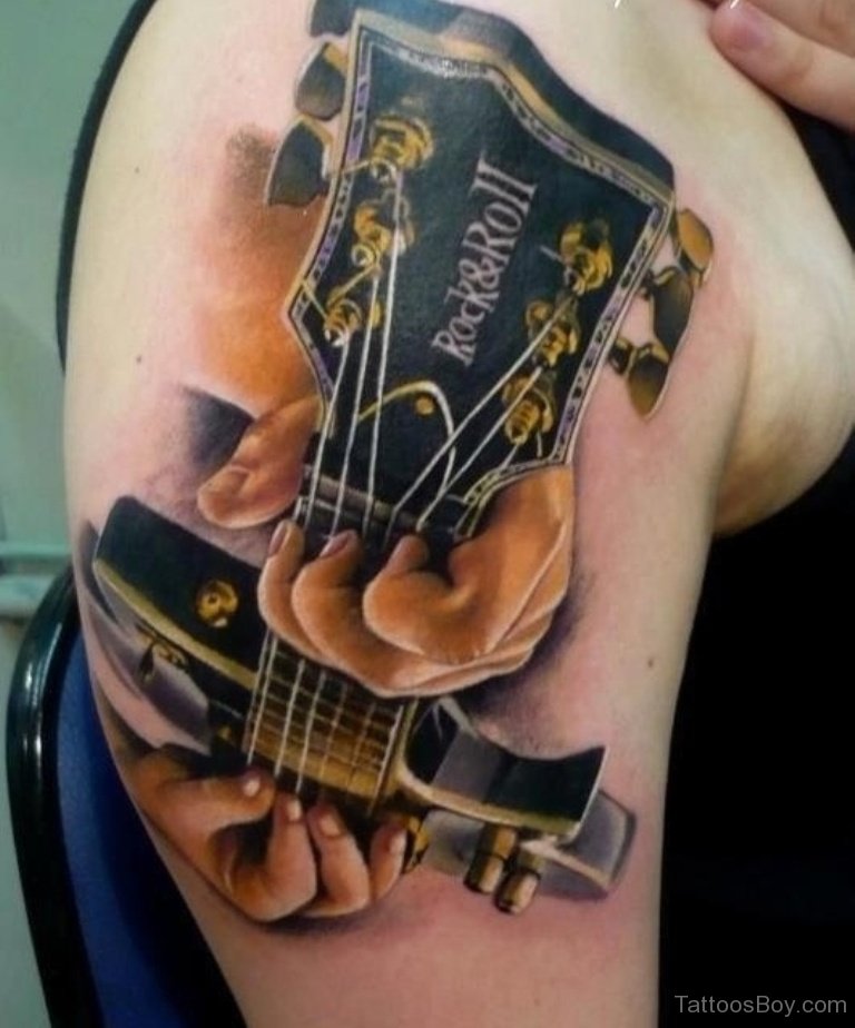 50+ Guitar Tattoo Ideas Stock Photos, Pictures & Royalty-Free Images -  iStock